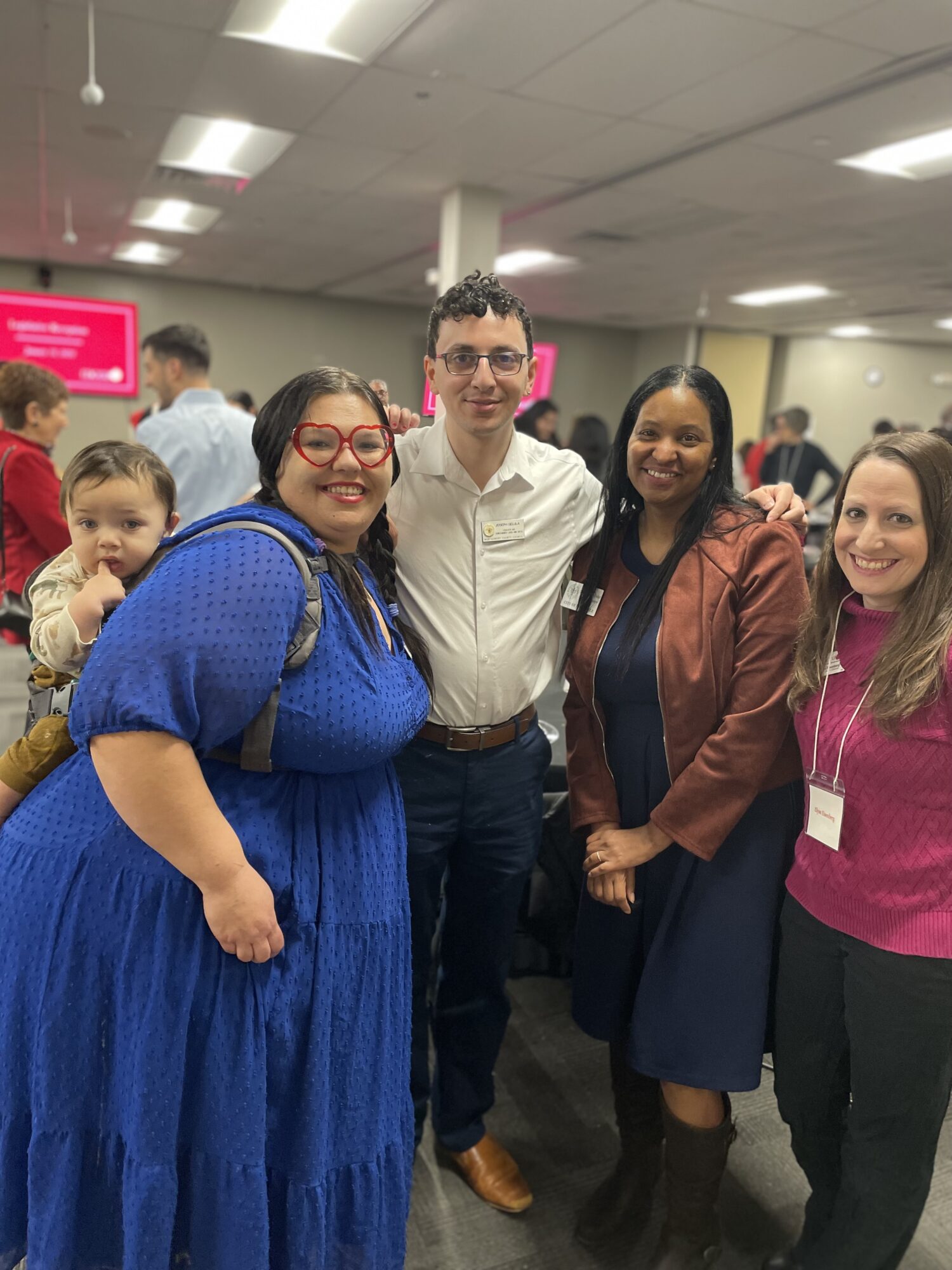 A group of attendees including Teri Kanu, MCEA board member, far left, and Izola Shaw, Councilmember for the city of Rockville, second from right.